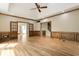 Living room with hardwood floors, wood trim, and doorways to other rooms at 3646 Sope Creek Farm Se, Marietta, GA 30067