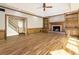 Living room with hardwood floors, fireplace, and built-in bookshelves at 3646 Sope Creek Farm Se, Marietta, GA 30067