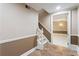 Entry with stairs leading down to finished basement space at 3646 Sope Creek Farm Se, Marietta, GA 30067