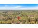 Aerial view of a home nestled in a lush, green landscape, marked with a location pin for easy identification at 481 Patillo Rd, Stockbridge, GA 30281