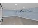 Large finished basement space with tile flooring, recessed lighting, and light blue walls at 481 Patillo Rd, Stockbridge, GA 30281