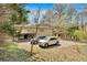 Spacious driveway with ample parking space, leading to a home with a convenient side-entry garage at 481 Patillo Rd, Stockbridge, GA 30281