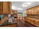 A modern kitchen featuring granite countertops, stainless steel appliances, and hardwood floors and outdoor views at 481 Patillo Rd, Stockbridge, GA 30281