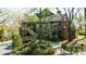 Multi-level exterior view with stairways, greenery, and brick accents at 432 Ansley Walk Ne Ter, Atlanta, GA 30309