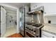 Modern kitchen equipped with stainless steel appliances, including a gas range and a side by side refrigerator at 432 Ansley Walk Ne Ter, Atlanta, GA 30309