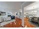 Bright, open living space with hardwood floors, fireplace, and connected dining area, perfect for modern living at 432 Ansley Walk Ne Ter, Atlanta, GA 30309