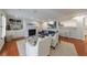Bright living room with a fireplace, built-in shelves, and a comfortable seating area with neutral color palette at 432 Ansley Walk Ne Ter, Atlanta, GA 30309