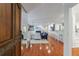 Open-concept living area with hardwood floors, fireplace, and seamless flow to the kitchen, great for entertaining at 432 Ansley Walk Ne Ter, Atlanta, GA 30309