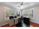 Office with hardwood floors, lots of natural light from the shuttered windows, and modern fixtures at 432 Ansley Walk Ne Ter, Atlanta, GA 30309