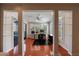 Home office with hardwood floors, a ceiling fan, and great natural light through shuttered windows at 432 Ansley Walk Ne Ter, Atlanta, GA 30309