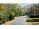Street view of a community with mature trees and lush landscaping at 432 Ansley Walk Ne Ter, Atlanta, GA 30309