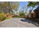 Brick wall-lined cobblestone drive leading to homes at 432 Ansley Walk Ne Ter, Atlanta, GA 30309