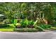 Beautiful landscaping and manicured lawn at the street corner, showcasing neighborhood pride at 432 Ansley Walk Ne Ter, Atlanta, GA 30309