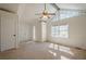 Spacious bedroom with vaulted ceiling, natural light and neutral colors throughout at 524 S Holly Springs Rd, Woodstock, GA 30188