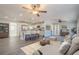 Open living space with modern decor featuring hardwood floors, neutral color palette and eat-in kitchen island at 524 S Holly Springs Rd, Woodstock, GA 30188