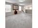 Neutral bonus room with carpet flooring, lots of light and ample space at 3049 Morgan Spring Trl, Buford, GA 30519
