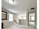 Upstairs bonus room featuring neutral carpet, bright light and lots of space at 3049 Morgan Spring Trl, Buford, GA 30519