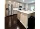 Bright kitchen featuring stainless steel appliances, an island, and ample counter space at 3049 Morgan Spring Trl, Buford, GA 30519