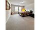 Bright main bedroom with wall art and comfortable carpet flooring at 3049 Morgan Spring Trl, Buford, GA 30519