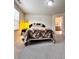 Bright main bedroom showing large windows, wall decor and carpet floors at 3049 Morgan Spring Trl, Buford, GA 30519
