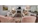 Inviting living room showcasing a cozy fireplace, plush seating and lots of natural light at 4000 N Stratford Ne Rd, Atlanta, GA 30342