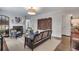 Bright living room featuring a cozy fireplace and classic decor with seamless access to other spaces at 4000 N Stratford Ne Rd, Atlanta, GA 30342