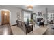 Bright living room with hardwood floors, a fireplace, and large window offering a comfortable space at 4000 N Stratford Ne Rd, Atlanta, GA 30342