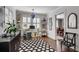 Stylish office with bright light, shutters, and an open plan to the dining room creating a great workspace at 4000 N Stratford Ne Rd, Atlanta, GA 30342