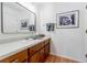 Bathroom featuring a vanity with a white countertop and stylish fixtures at 4183 Oak Crest Dr, Tucker, GA 30084