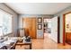 Bedroom with hardwood floors, a window, a closet, and a desk at 4183 Oak Crest Dr, Tucker, GA 30084