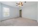 Standard bedroom with a ceiling fan and closet at 1075 Pebble Bend Dr, Grayson, GA 30017