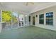 Spacious screened patio with a ceiling fan and a view at 1075 Pebble Bend Dr, Grayson, GA 30017