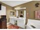 Bathroom featuring a soaking tub, a shower, tile flooring, and neutral decor at 777 Glen Valley Way, Dacula, GA 30019