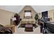 Functional bedroom featuring an ensuite office space, cozy carpet, and natural light at 777 Glen Valley Way, Dacula, GA 30019