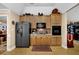 Well-equipped kitchen with stainless steel refrigerator and modern appliances at 777 Glen Valley Way, Dacula, GA 30019