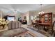 Living room featuring a comfortable seating area with a ceiling fan and natural light at 777 Glen Valley Way, Dacula, GA 30019