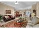 Elegant living room with decorative area rug, neutral tones, and ample seating at 777 Glen Valley Way, Dacula, GA 30019