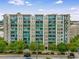 Modern residence with balconies and beautiful architecture, with trees and street view at 1100 Howell Mill Nw Rd # 711, Atlanta, GA 30318