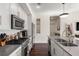 Modern kitchen with stainless appliances, island and white cabinets at 1100 Howell Mill Nw Rd # 711, Atlanta, GA 30318
