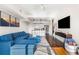 Sun-filled open floor plan features a spacious living area and modern kitchen with stainless steel appliances at 1100 Howell Mill Nw Rd # 711, Atlanta, GA 30318