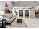 Lobby with stylish seating, modern elevators, and art that creates a welcoming and sophisticated ambiance at 1100 Howell Mill Nw Rd # 711, Atlanta, GA 30318