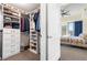 Spacious walk-in closet with custom shelving and bedroom access at 1100 Howell Mill Nw Rd # 711, Atlanta, GA 30318