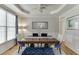 Formal dining room showcases elegant decor, crown molding, and natural light at 4880 Stone Moss Path, Hoschton, GA 30548