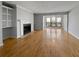 Spacious living room featuring a fireplace, built-ins, and large windows at 4640 Vinings Central Se Run # 128, Atlanta, GA 30339