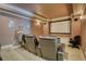 Home theater room with comfortable seating and a large screen at 4777 Ardmore Ln, Hoschton, GA 30548