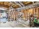 Unfinished basement with exposed framing, exercise equipment, and plenty of storage potential at 1142 Hidden Spirit Trl, Lawrenceville, GA 30045
