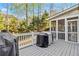 Outdoor deck with white railing and two grills, perfect for entertaining at 1142 Hidden Spirit Trl, Lawrenceville, GA 30045