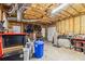 Spacious garage with insulated walls, storage, and ample room for projects and parking at 1142 Hidden Spirit Trl, Lawrenceville, GA 30045
