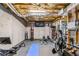 Home gym with workout equipment, motivational banner, and rubber flooring at 1142 Hidden Spirit Trl, Lawrenceville, GA 30045