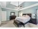 Spacious main bedroom with tray ceiling, carpeted floor, and neutral paint at 1142 Hidden Spirit Trl, Lawrenceville, GA 30045